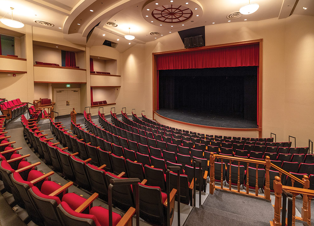 Oats Park Art Center theater with red chairs, tiered.