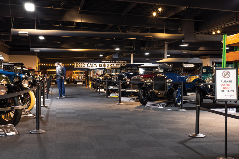 Two men looking at older cars at the National Automobile Museum in Reno.