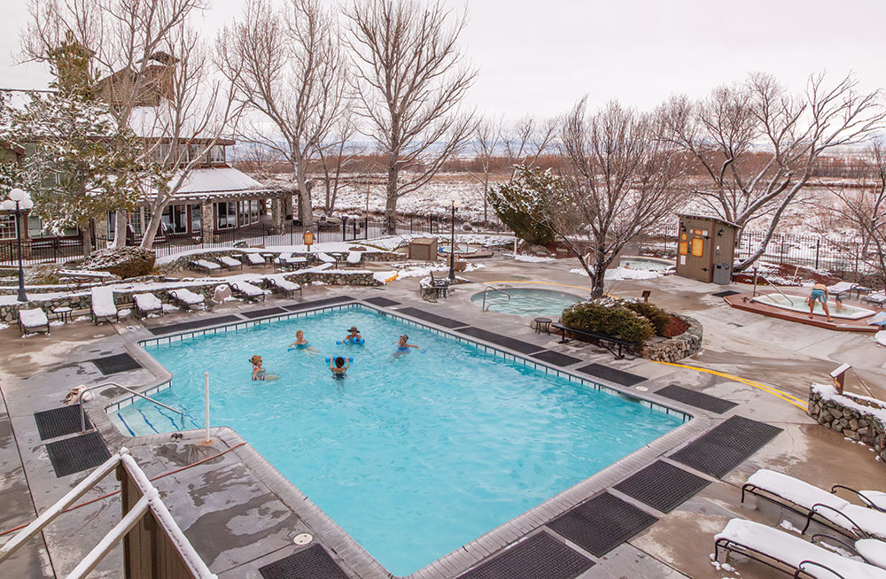 A group of people in a pool at David Walley's Resort