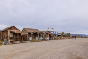 Two women walking down the street at living ghost town of Gold Point.