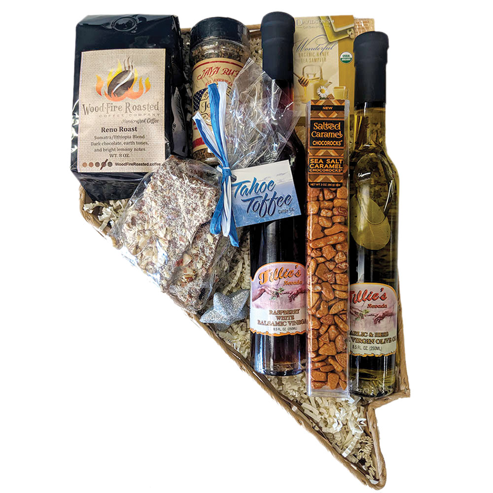 Flag Store Sign & Banner in Sparks, photo shows a gift basket in the shape of Nevada that has coffee, caramels, toffee, oils, vinegars, honey, seasonings, soaps, and more.