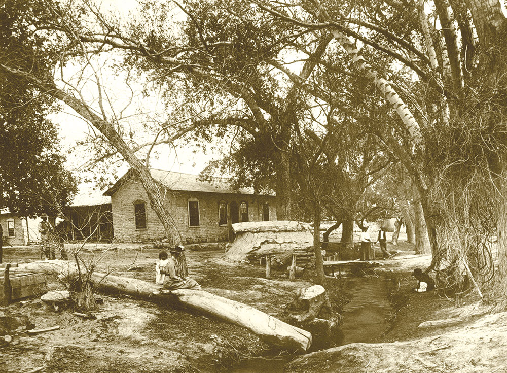 Sepia photo of Helen Stewart Ranch circa 1900. There are 5 people visible in the photo. ©University of Nevada, Las Vegas