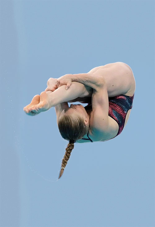 Olympian Krysta Palmer in the middle of a dive