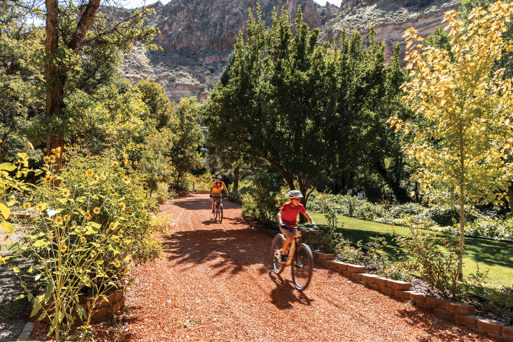 Two people riding bikes through Kershaw-Ryan State Park.