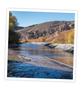 Road flooding in fall time at Rainbow Canyon.