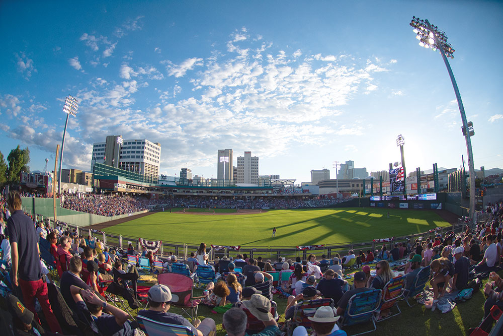 Greater Nevada Field with crowd cheering at a Reno Aces game.
